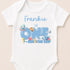 A white baby onesie with a personalized text and illustrations related to the ocean theme.