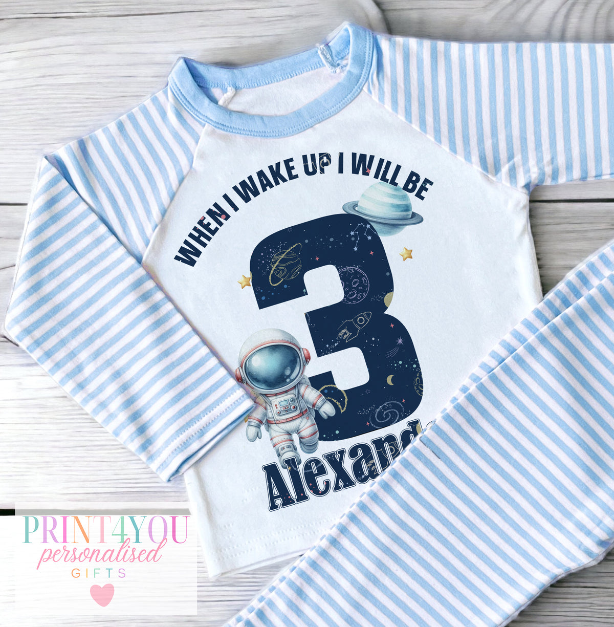Personalised blue striped boys pyjamas with space astronaut when I wake up design, size 6-12 months