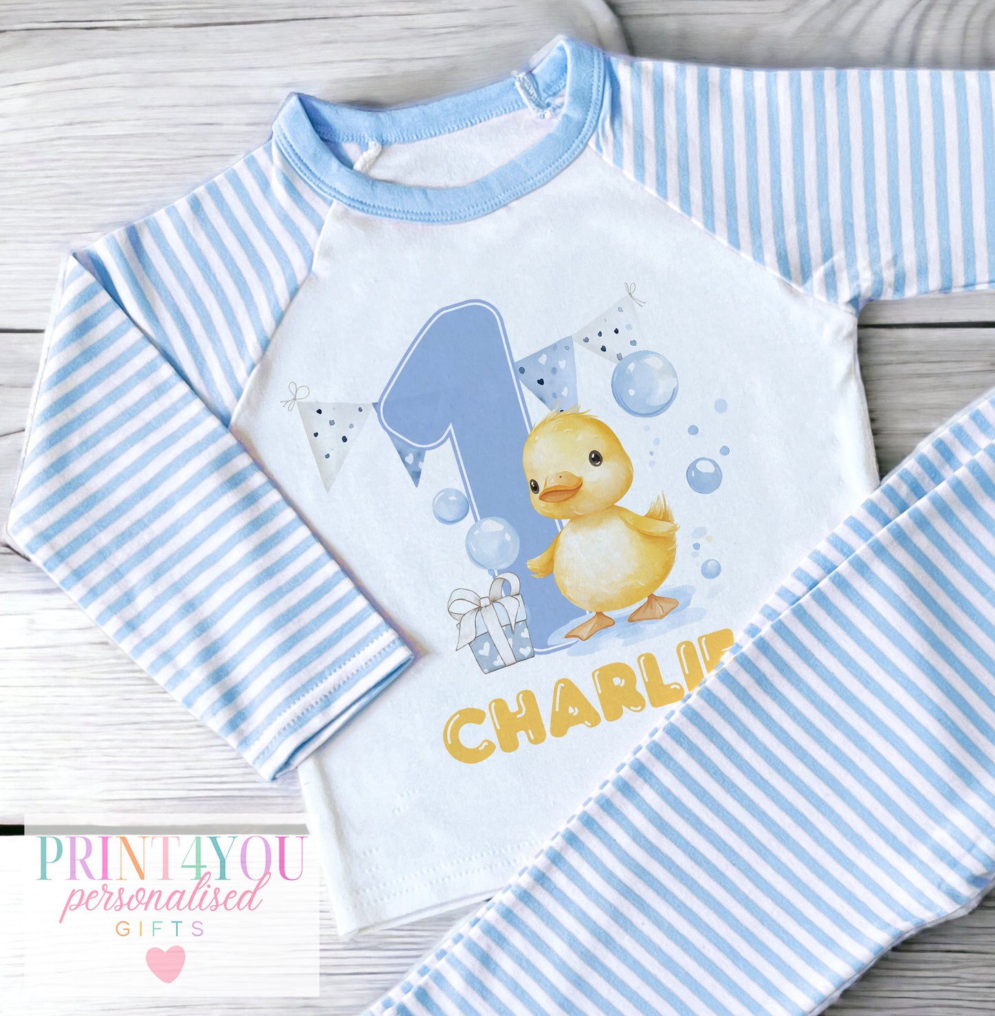 Personalised playful rubber duck design on blue and white striped baby and children's vest, personalised with child's name