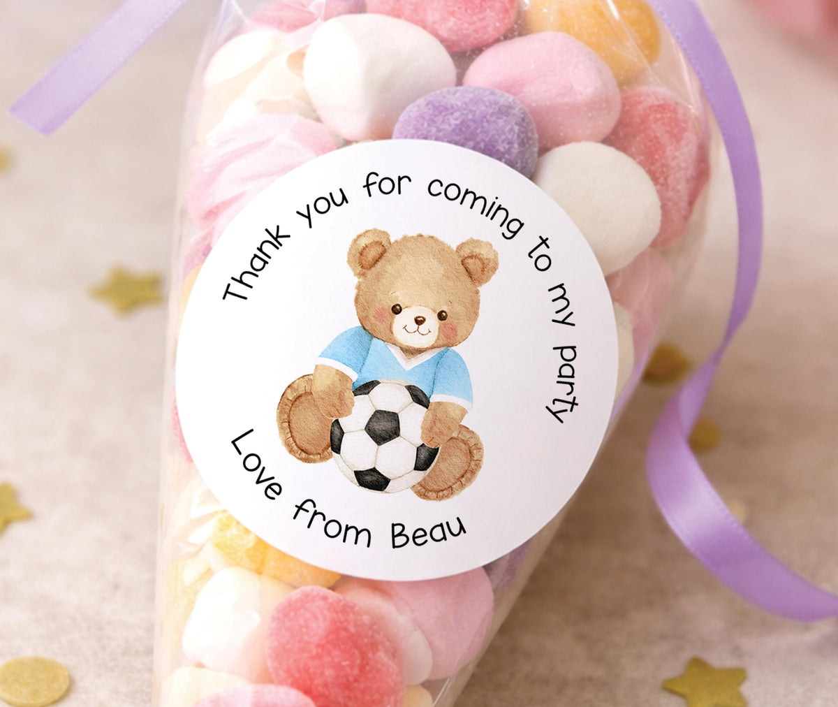Glossy round personalised football teddy bear stickers, printed with a child's name for boy's birthday party bags