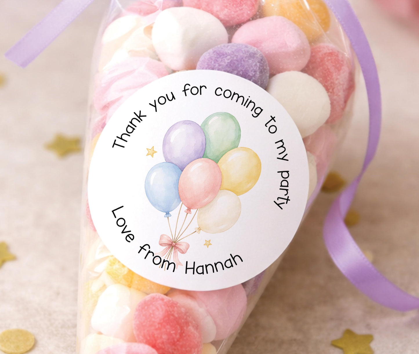 Sheet of glossy round stickers featuring a pastel balloon design, personalised for birthday party bags and sweet cone favours