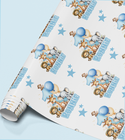 The image is a roll of wrapping paper with a repeating pattern of cartoon animal illustrations, including elephants, lions, and other animals, along with blue balloons and stars.