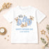 Personalised World’s Best Dad children’s white t-shirt with blue teddy bear Father’s Day design and custom name text on a neutral styled background