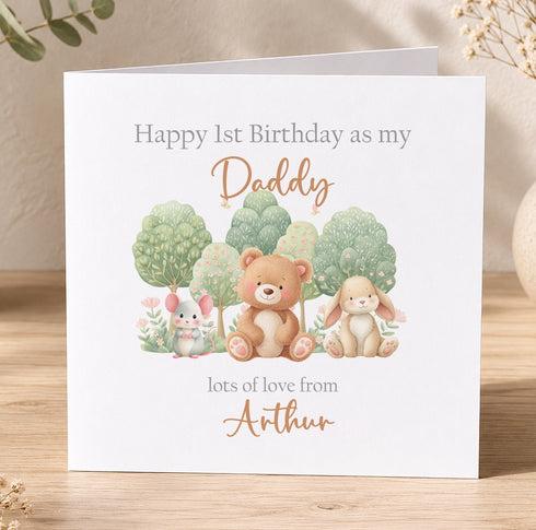 A birthday card with a picture of a bear, rabbit, and mouse, along with the text "Happy 1st Birthday as my Daddy Lots of love from Arthur".