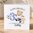 A birthday card with a teddy bear wearing a soccer uniform and a trophy, celebrating a 3-year-old's birthday.