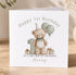 A birthday card with a teddy bear and balloons, celebrating a first birthday for a very special grandfather named Harry.