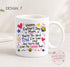 A white ceramic mug with a colorful design featuring text and illustrations related to Father's Day.