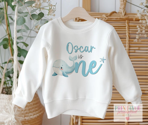 Personalised Whale “Is One” 1st Birthday Jumper – Baby Boy Ocean Theme Sweatshirt – Custom Name – Soft White Jumper – Sizes 6-12m to 4yrs