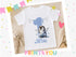 A white t-shirt with a penguin graphic and the number 1, along with the text "Afbie" printed on it, is displayed in the image.