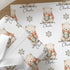 Personalised Christmas wrapping paper featuring a cute polar bear holding a festive mug, custom name Christmas gift wrap with winter snowflakes.