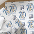 Personalised golf birthday wrapping paper featuring a gentleman golfer, blue golf buggy, custom name, age and relation, birthday gift wrap.
