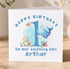 A birthday card with a whale and turtle illustration, along with the text "Happy Birthday to our amazing son Arthur".