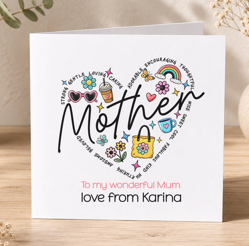 A handmade card with a heart-shaped design featuring various colorful elements, such as flowers, butterflies, and a rainbow, along with the word "Mother" written in a stylized font.
