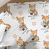 Printed christmas wrapping paper shown as wrapping paper