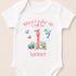 A white baby onesie with a personalized design featuring a dolphin, starfish, and other sea creatures, along with the text "When I wake up I will be 1 Summer".