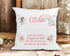 "A decorative pillow with a white background, placed on a wooden surface. The pillow features whimsical illustrations of fairies and butterflies, along with a colourful rainbow and clouds. The text on the pillow reads: 'Childs name, Read me a story, Snuggle me tight, Tell me you love me, and kiss me goodnight