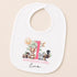 A white baby bib with a personalized design featuring a sun, animals, and the text "1 BIRTHDAY GIRL Eva".