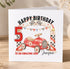 A birthday card with a red car and checkered flags, celebrating the 5th birthday of a son named Jenson.