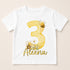 A white t-shirt with a yellow number 3 and a bee design, along with the name "Alena" written below it.