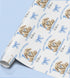 a blue and white wrapping paper with a picture of a teddy bear
