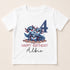 A white t-shirt with a graphic design featuring three cartoon axolotls, which are a type of salamander, and the number 4. The text below the design reads "Happy Birthday Albie".