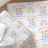 Personalised rainbow birthday wrapping paper featuring pastel rainbow, custom name, age and relation, colourful birthday gift wrap for girls.