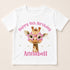 A white t-shirt with a giraffe wearing pink star-shaped glasses and the text "Happy 4th Birthday Annabel" printed on it.