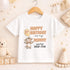 May include: White short-sleeved t-shirt featuring a cartoon cow holding a balloon. The text reads "HAPPY 1ST BIRTHDAY as my MUMMY" and "Love from Delilah-Rose". The shirt is displayed on a wooden hanger.
