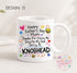 A white ceramic mug with a colorful design featuring text and illustrations related to Father's Day.