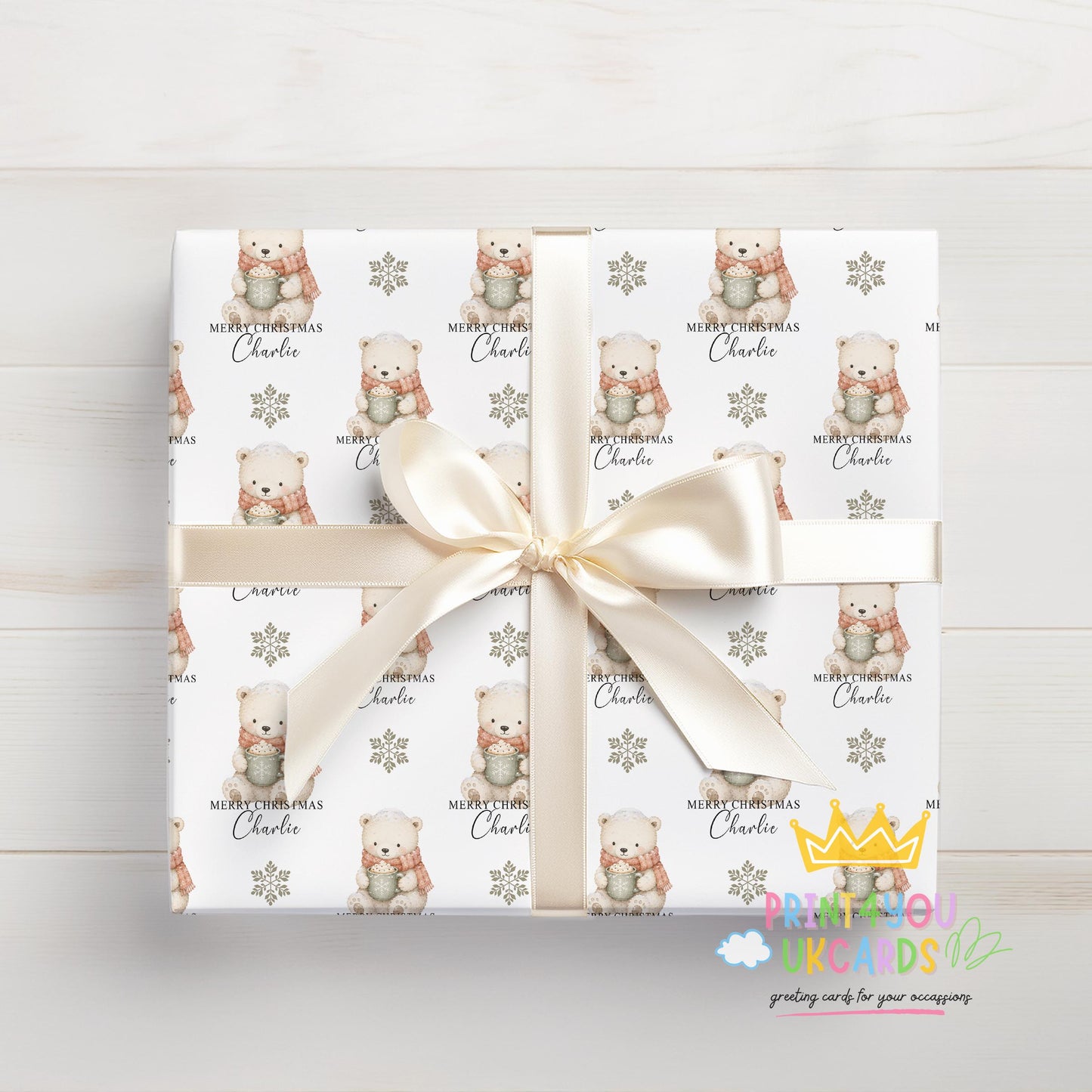 Personalised polar bear Christmas wrapping paper rolled and ready to post in a postal tube