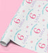 a roll of wrapping paper with a repeating pattern of the number 6 and the text "Happy Birthday Layla" printed on it.