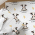 Personalised farm animal birthday wrapping paper featuring a cute dairy cow and chick, custom name and age, birthday gift wrap for children.