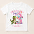 A white t-shirt with a birthday girl design, featuring a green dinosaur, balloons, and the number 3.