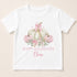 A white t-shirt with a graphic design featuring a floral arrangement of pumpkins and a bow, along with the text "Happy Halloween Eloise".