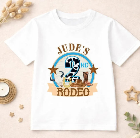 Personalised 2nd birthday rodeo t-shirt or sweatshirt for boys, second rodeo western themed outfit with cow print number 2, cowboy boots, hat and stars, custom name birthday top age 2 toddler