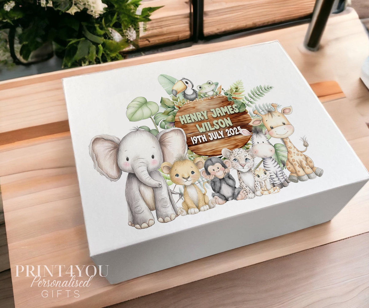 White magnetic keepsake box personalised with a name and date on a wooden-style sign, surrounded by jungle safari animals and greenery