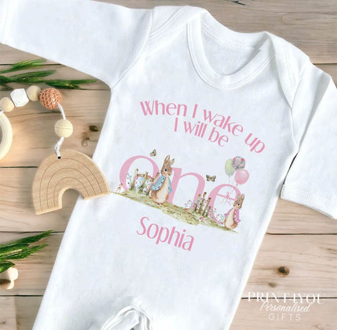 Personalised When I Wake Up I Will Be One Sleepsuit and vest, Pink Rabbit First Birthday Outfit.