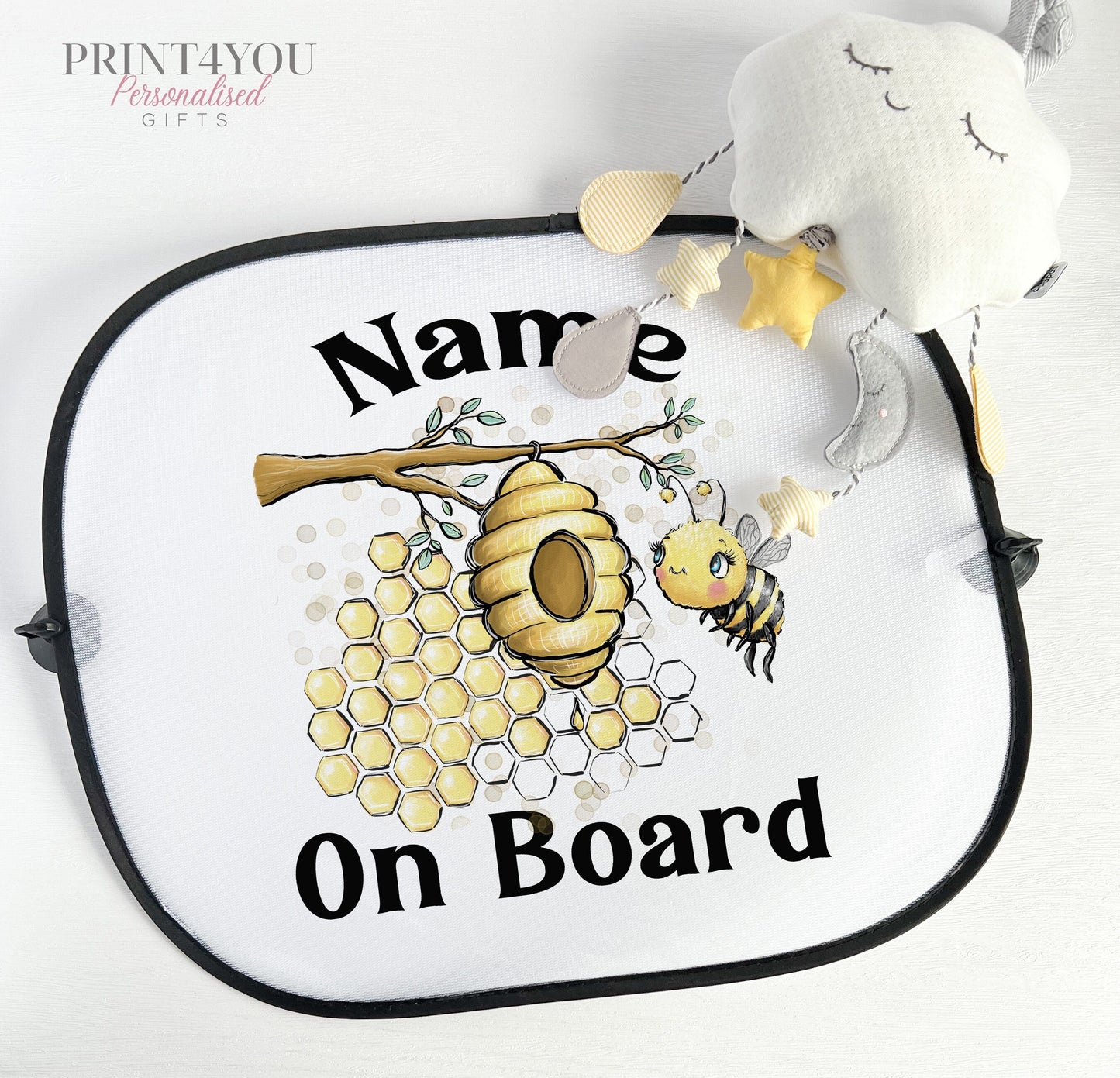 Personalised car sun shade with a cute bumble bee design and baby on board wording