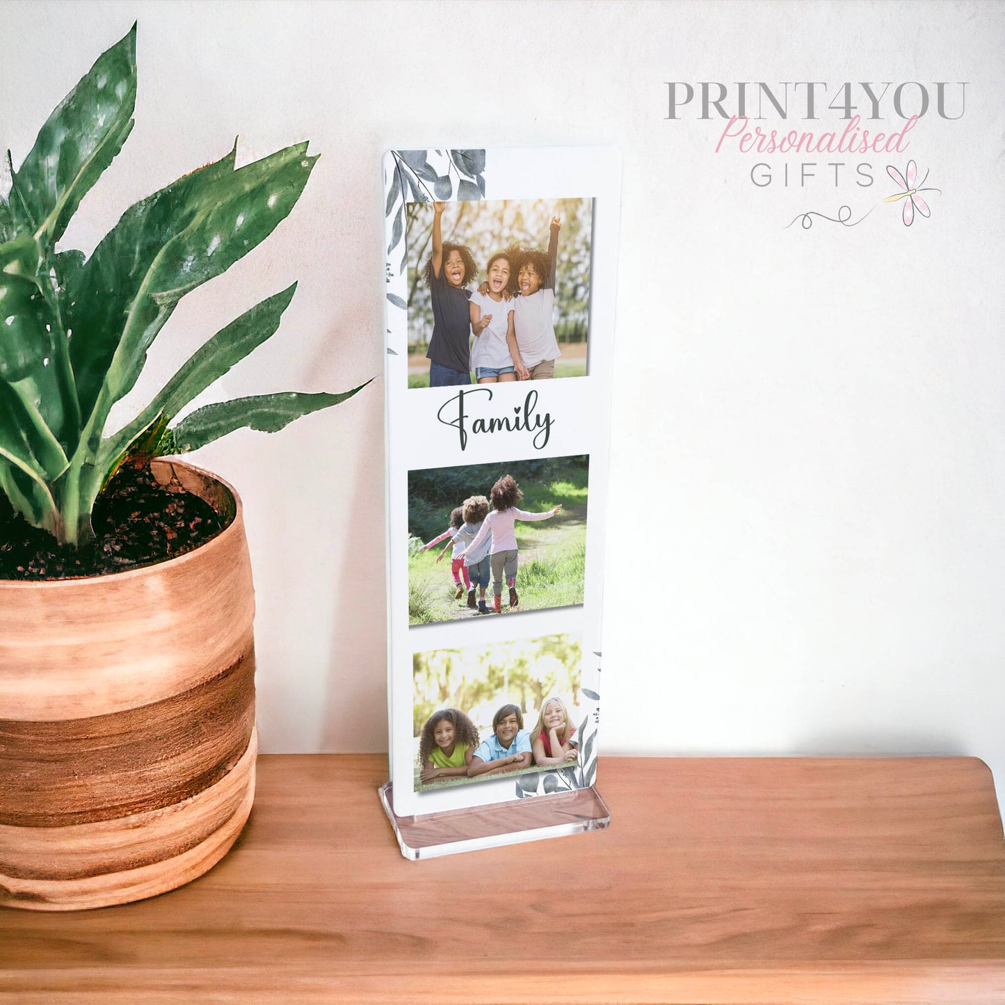 Personalised white acrylic photo stand holding three portrait photos, freestanding 3-photo family display block