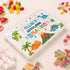 Personalised children’s travel snack box with colourful dinosaurs and prehistoric scenery