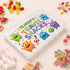 Personalised children’s travel snack box featuring colourful friendly monsters and a rocket