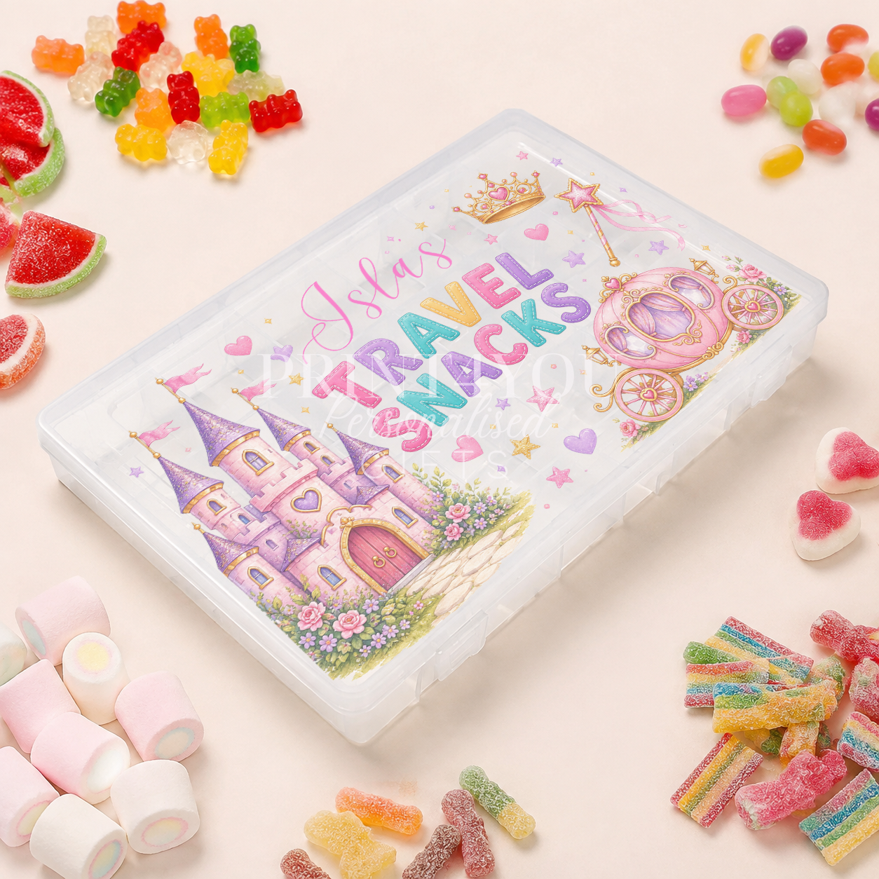 Personalised children's travel snack box with a pastel princess castle, carriage and crown