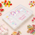 Personalised children’s travel treat box featuring a pastel unicorn, rainbow and stars