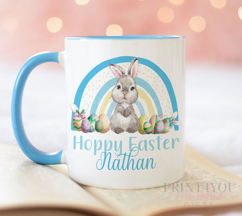 Blue trim personalised Easter Gift Mug (full size), Easter Bunny Rabbit with Rainbow and eggs