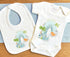 Personalised Baby and Toddler white Body suit and vest, New Baby Gift Set, Dinosaurs on a blue / green Rainbow