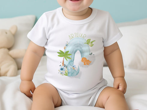 Personalised Baby and Toddler white Body suit and vest, New Baby Gift Set, Dinosaurs on a blue / green Rainbow