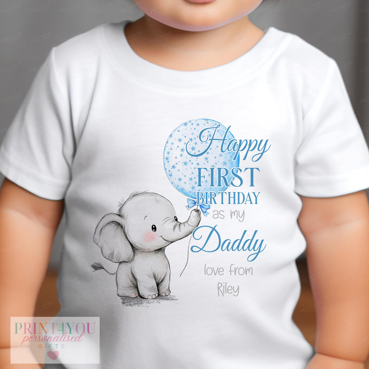 Close-up of the blue elephant and balloon print with personalised name on baby clothing