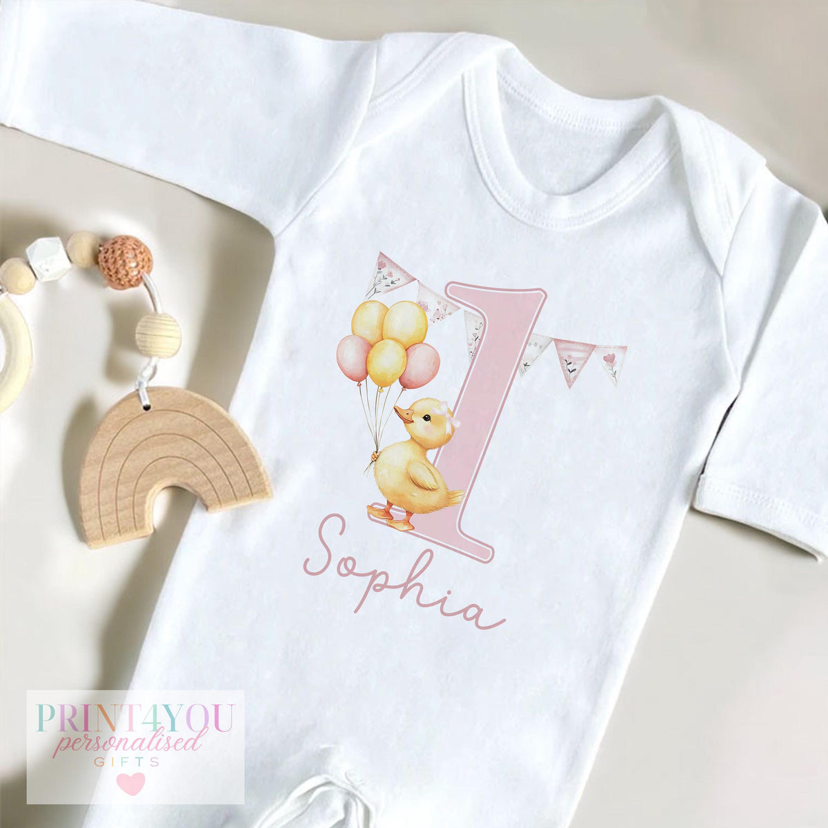 Personalised duck birthday pyjama top, shown with pink and white stripes