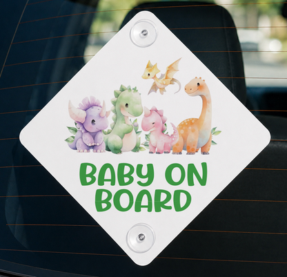 Baby on board aluminium car window sign with cute mixed dinosaurs design