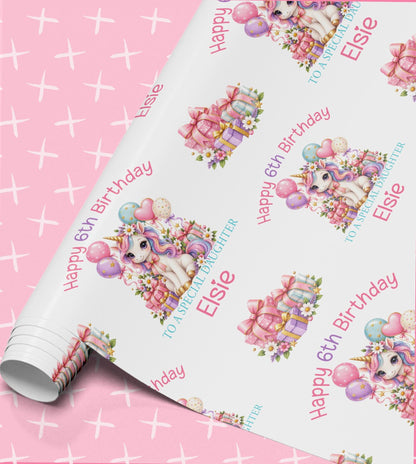 Personalised unicorn wrapping paper roll printed with Happy 6th Birthday, To a Special Daughter and the name Elsie